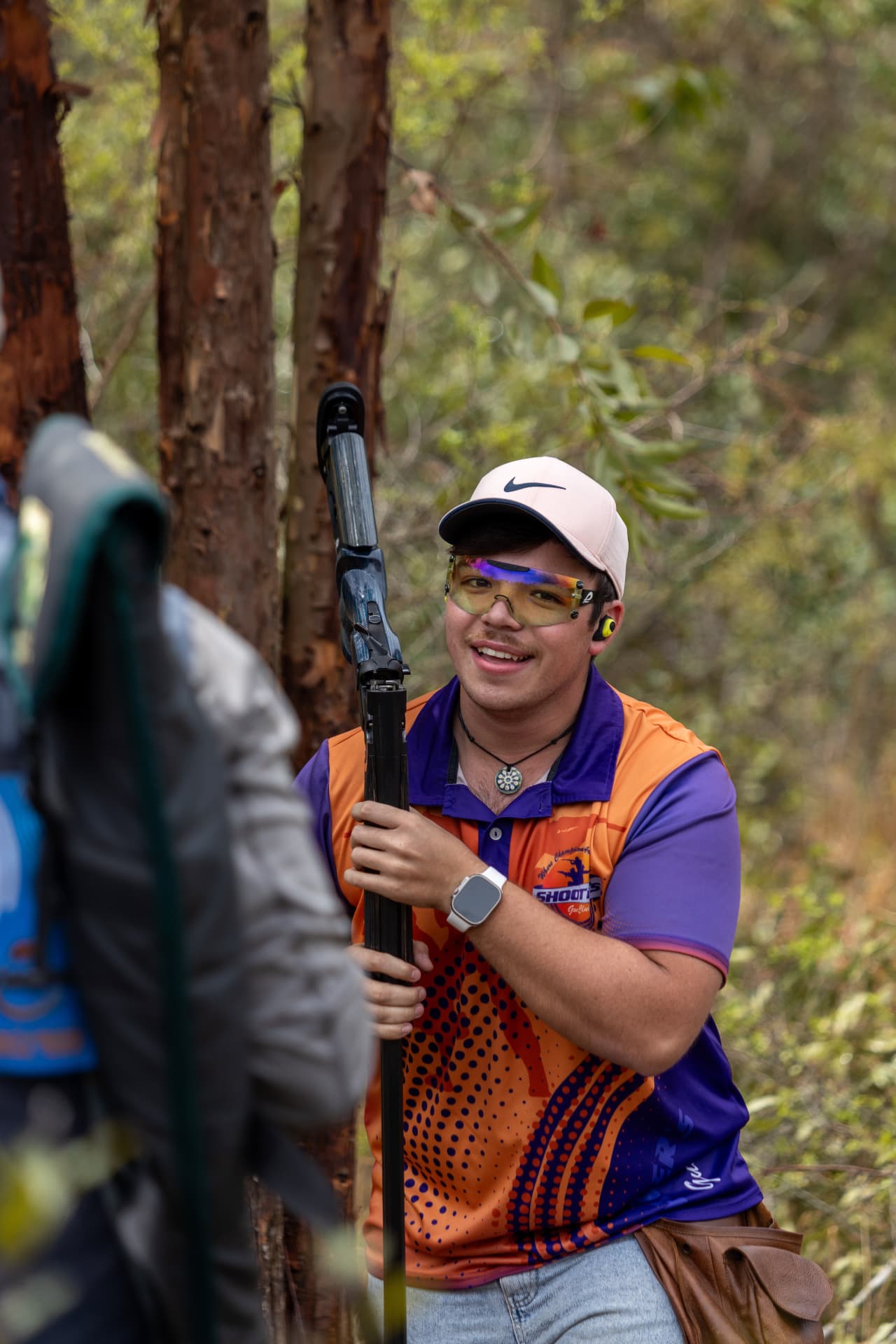 Young competitor smiling after a club final