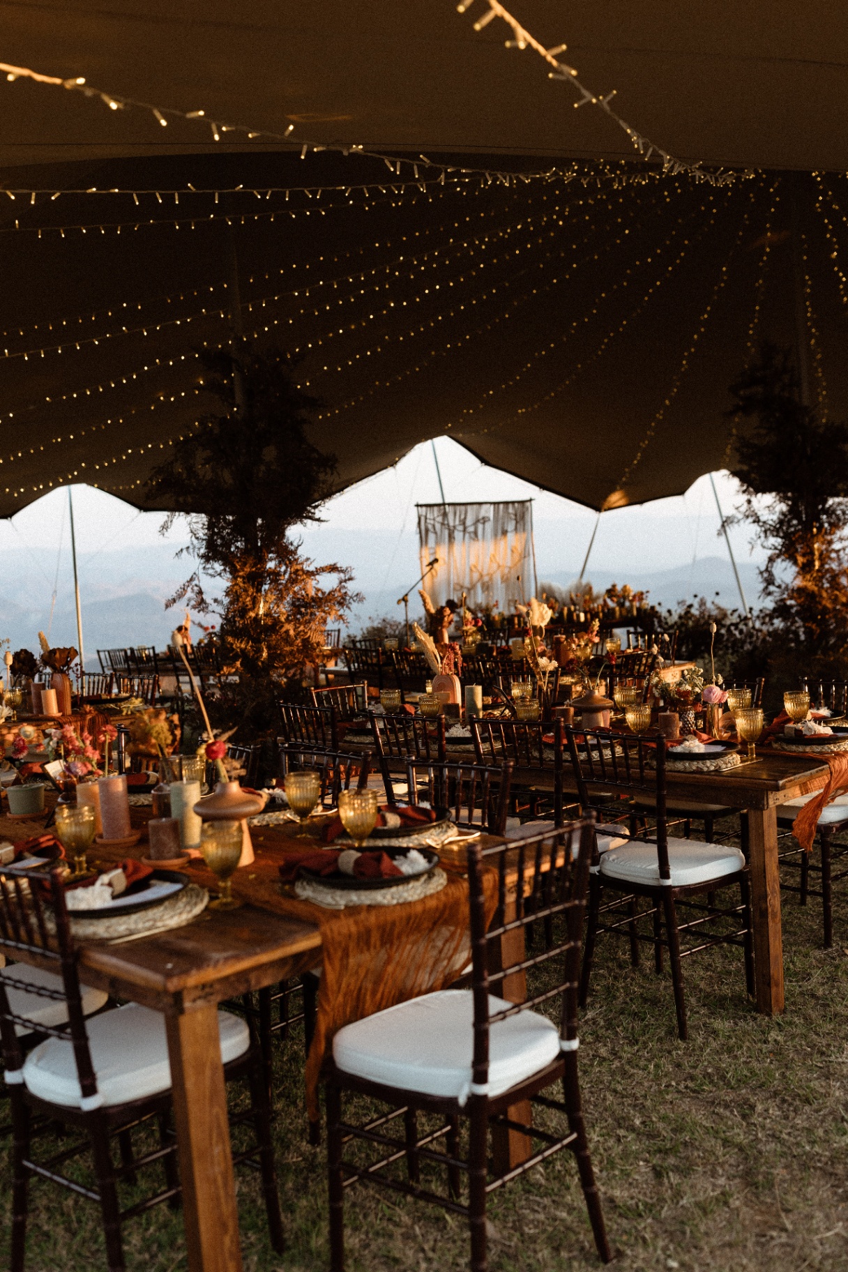 Reception marquee lit at dusk at a wedding venue near Nelspruit