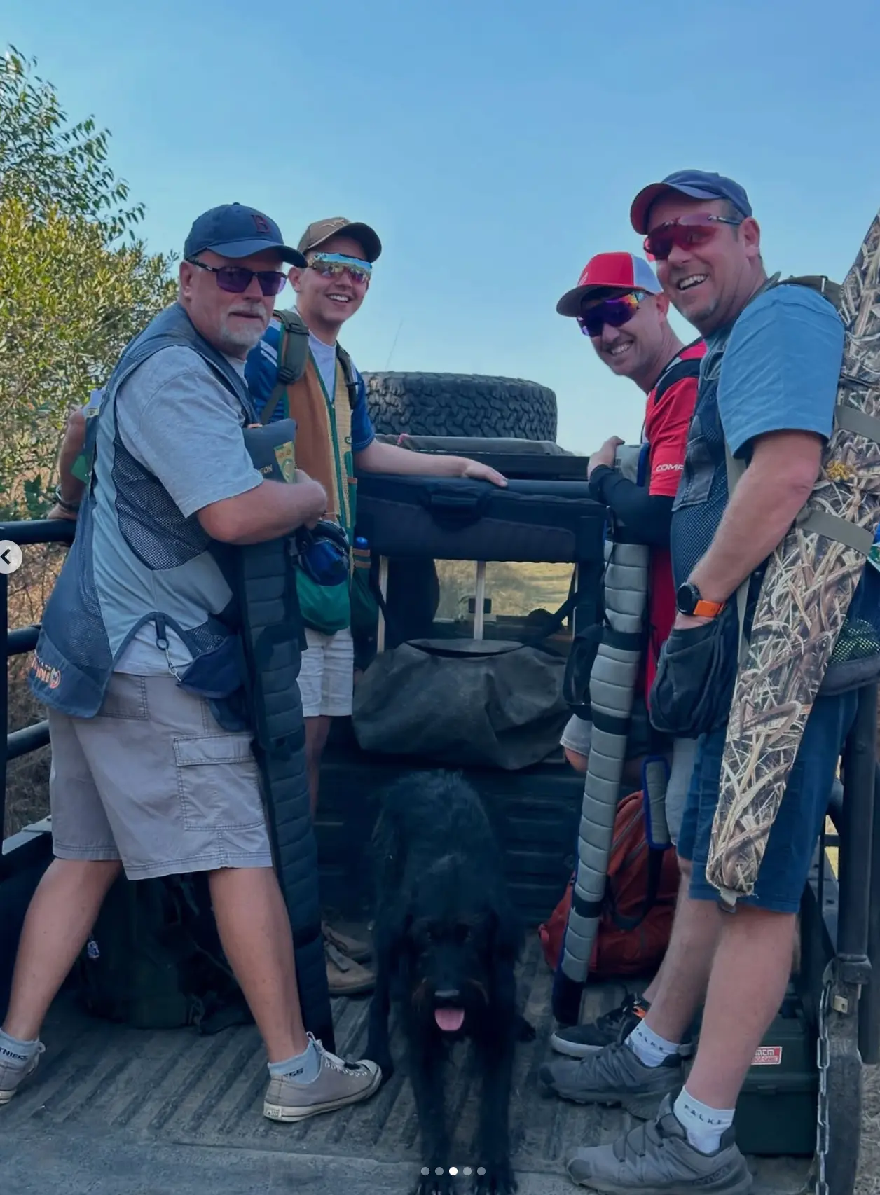 Shooters and the club dog in the back of a game viewer