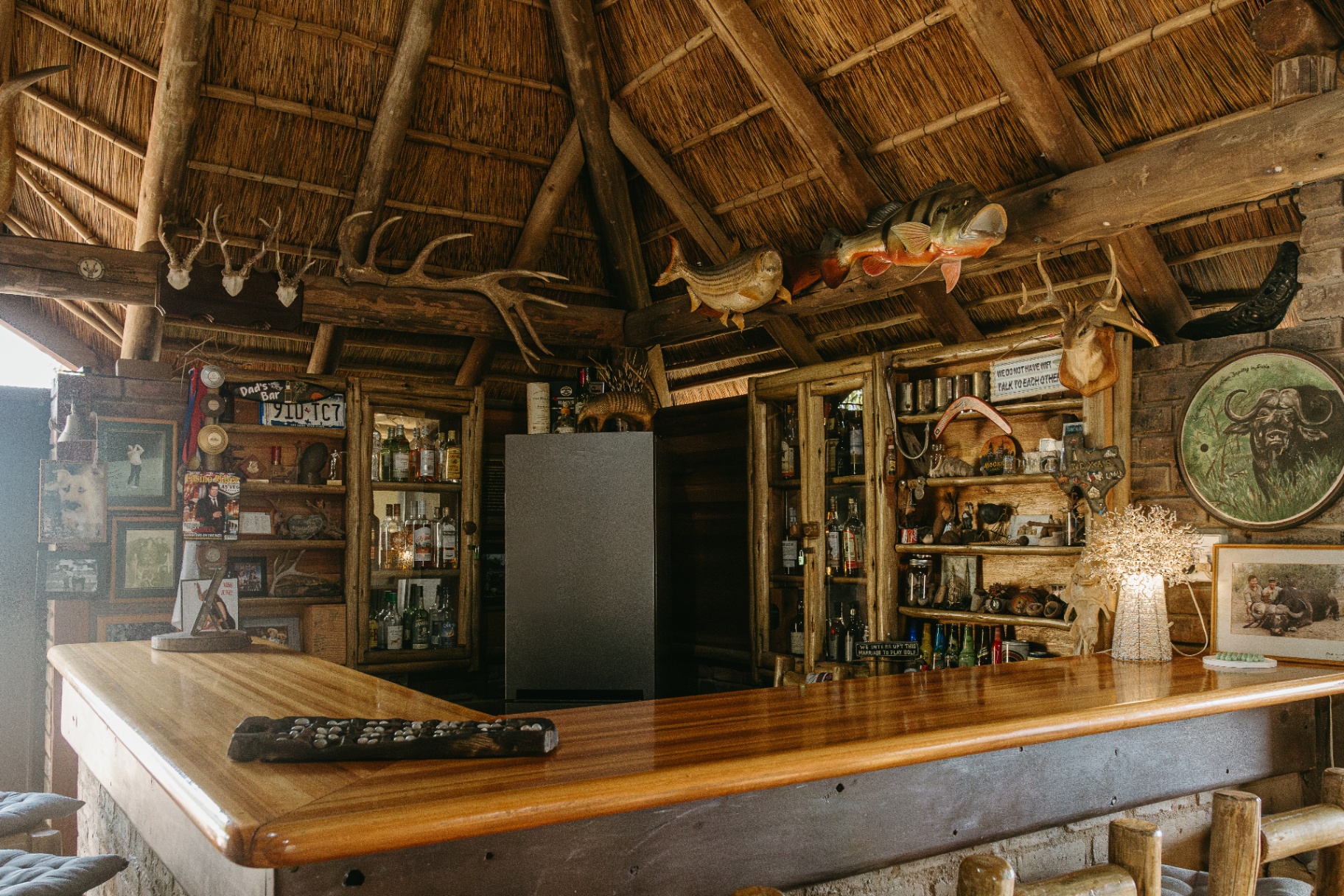 Interior bar area under thatch with trophies